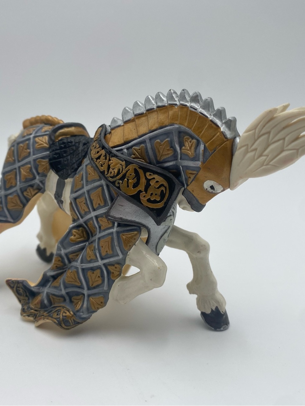 Vintage Black Decorative Armored Horse Figurine in Gold and Gray